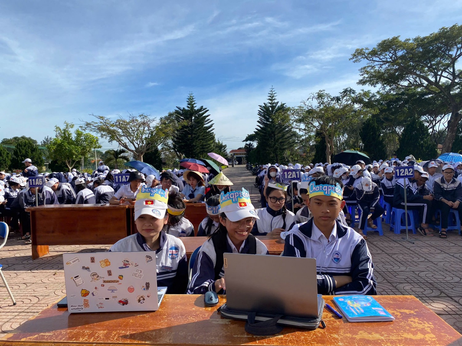 '''''A group of people sitting at a table with a computer
AI-generated content may be incorrect.'''''